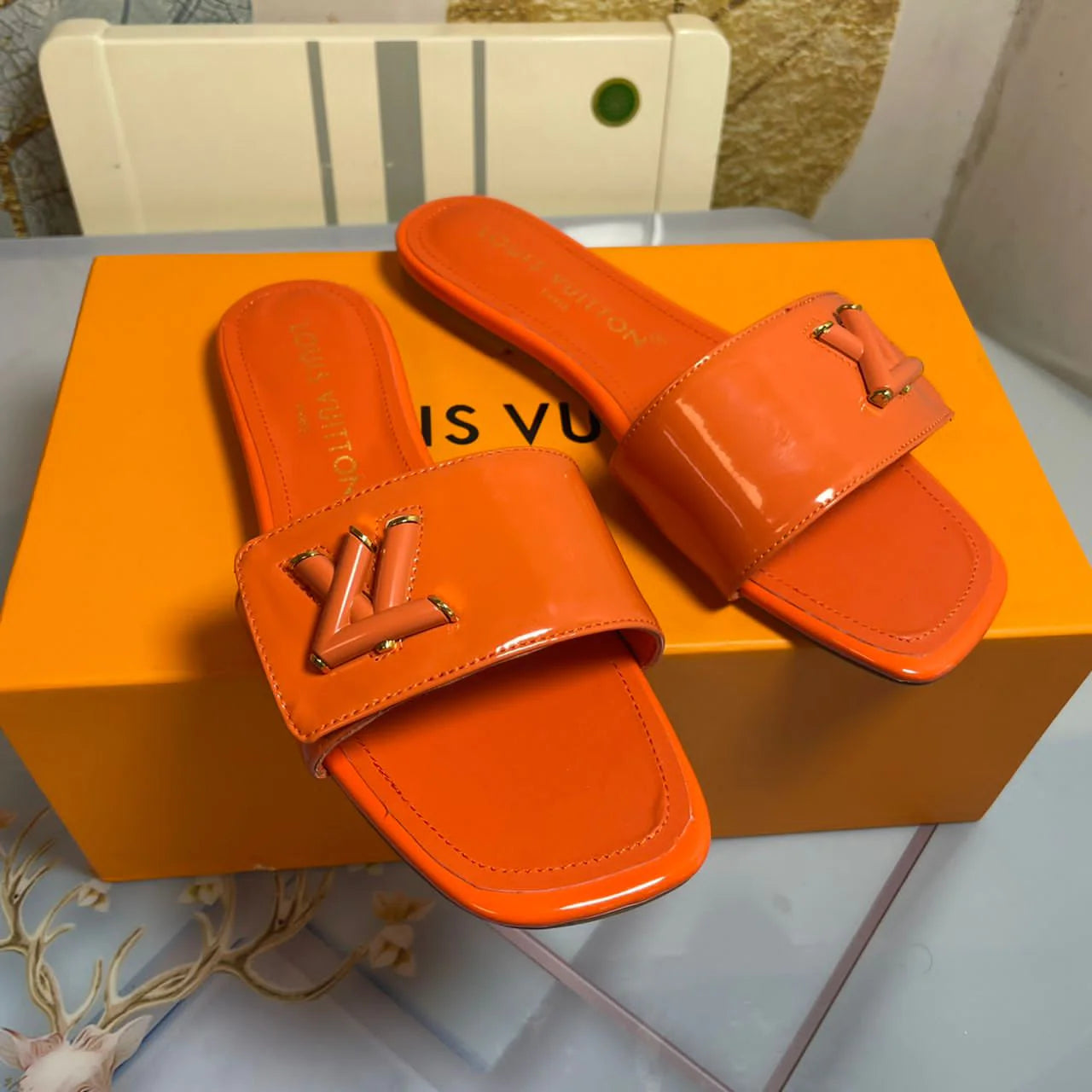 LV SWIMSUIT AND SLIDE SET