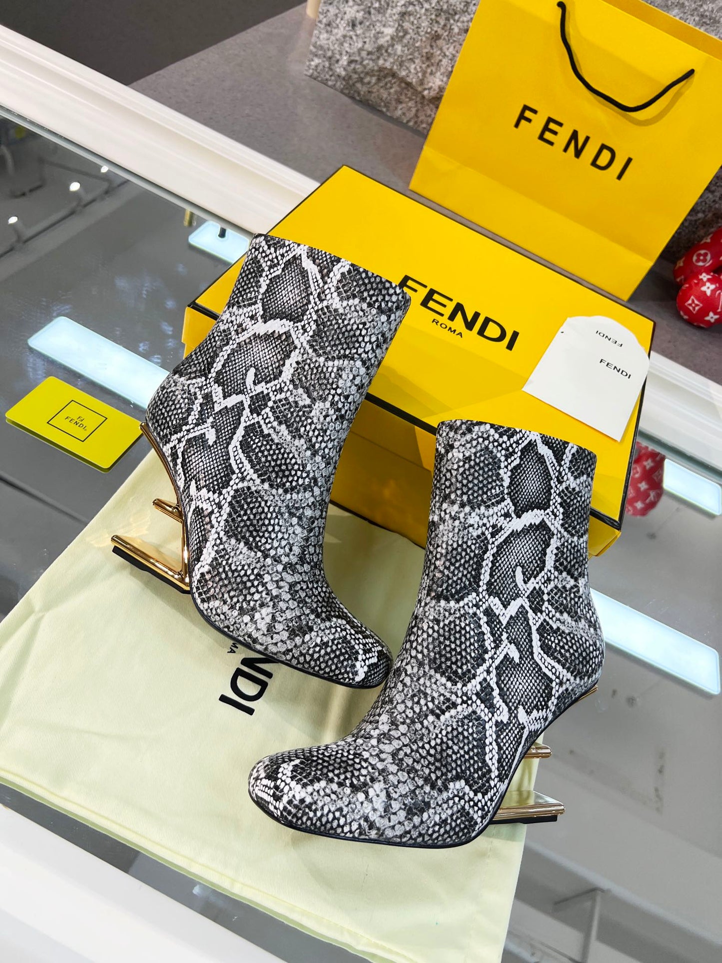 Fendi Snake Skin Boots